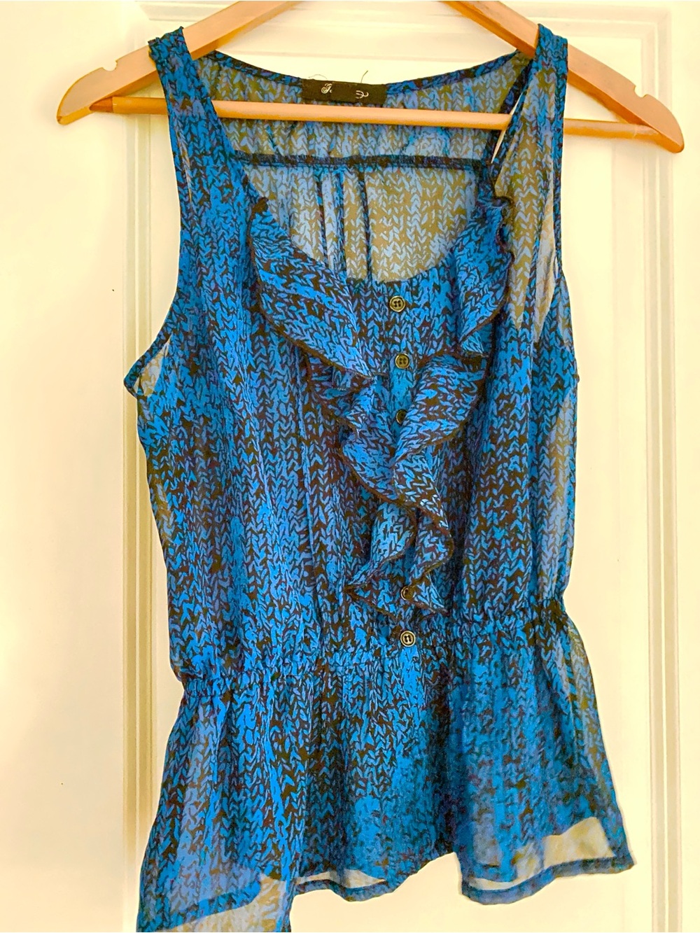 Blue Ruffle Sleeveless Peplum Top